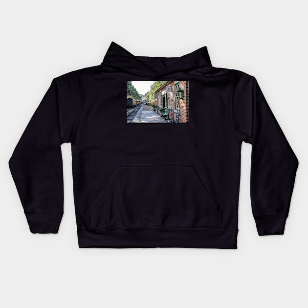 An empty Holt train station on the Poppy Line railway Kids Hoodie by yackers1
